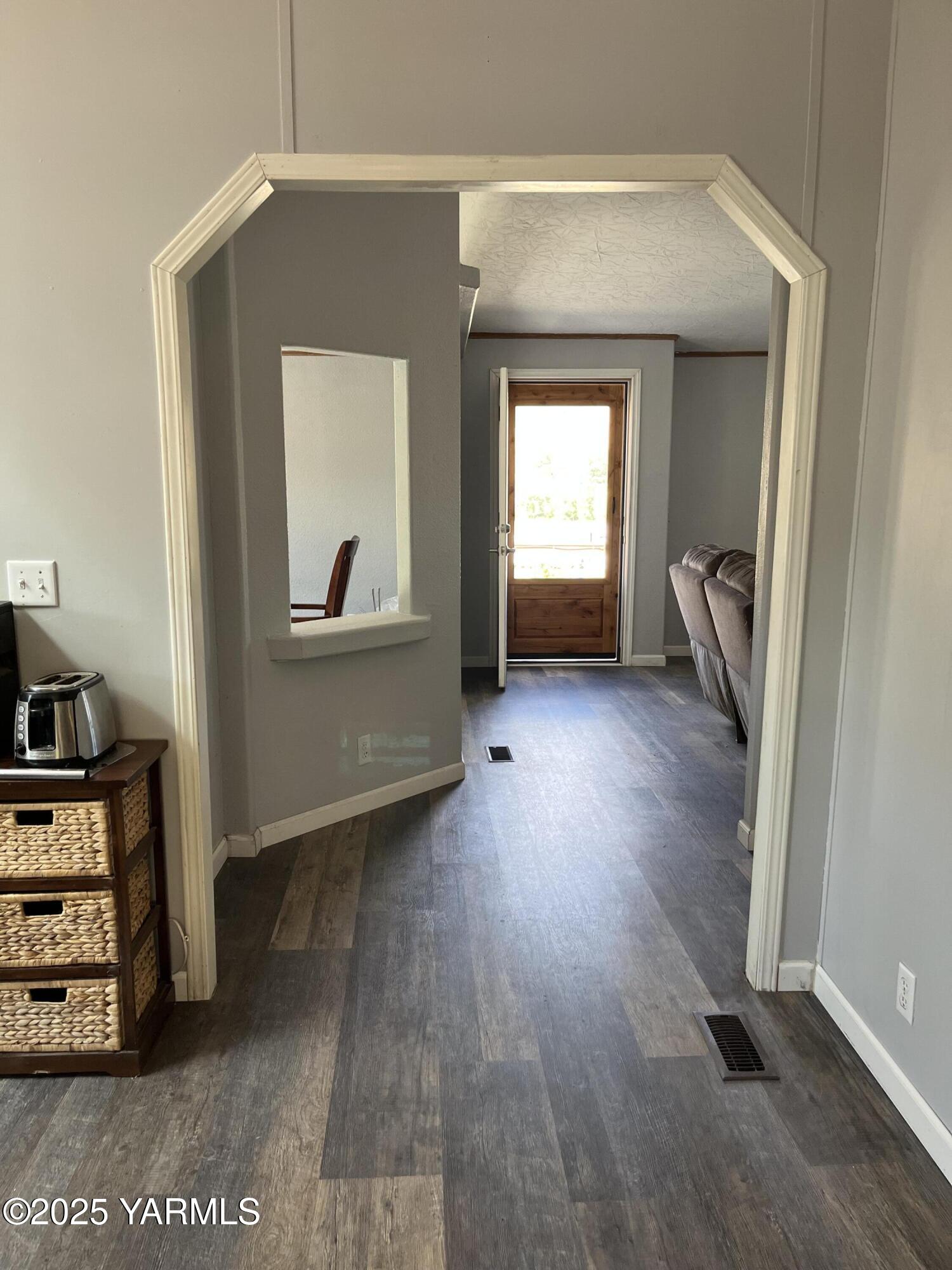14190 North Wenas Road Selah, WA 98942 - Photo 24 of 62 a view of a livingroom with wooden floor and closet