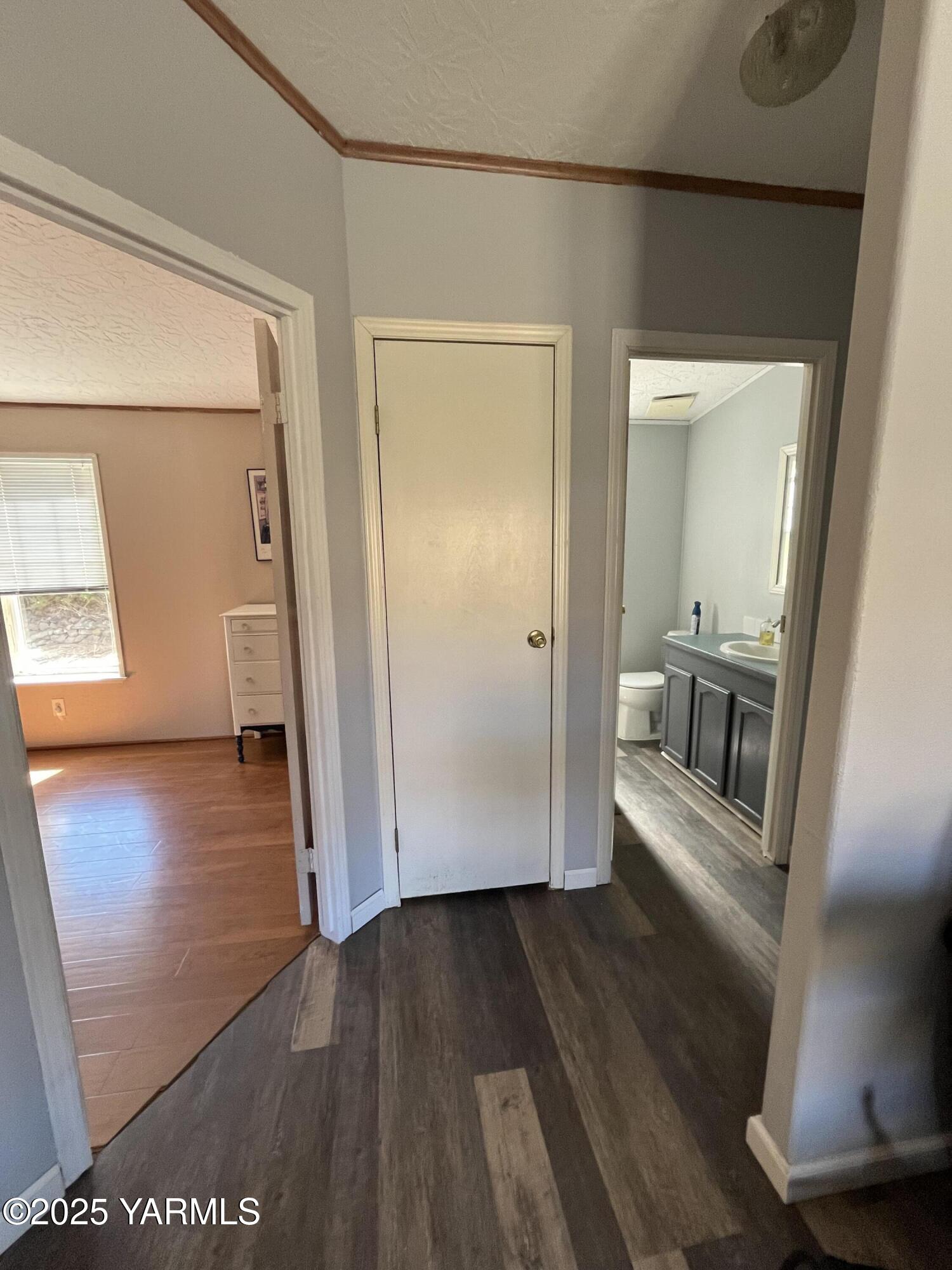 14190 North Wenas Road Selah, WA 98942 - Photo 29 of 62 a view of a hallway view with wooden floor and staircase
