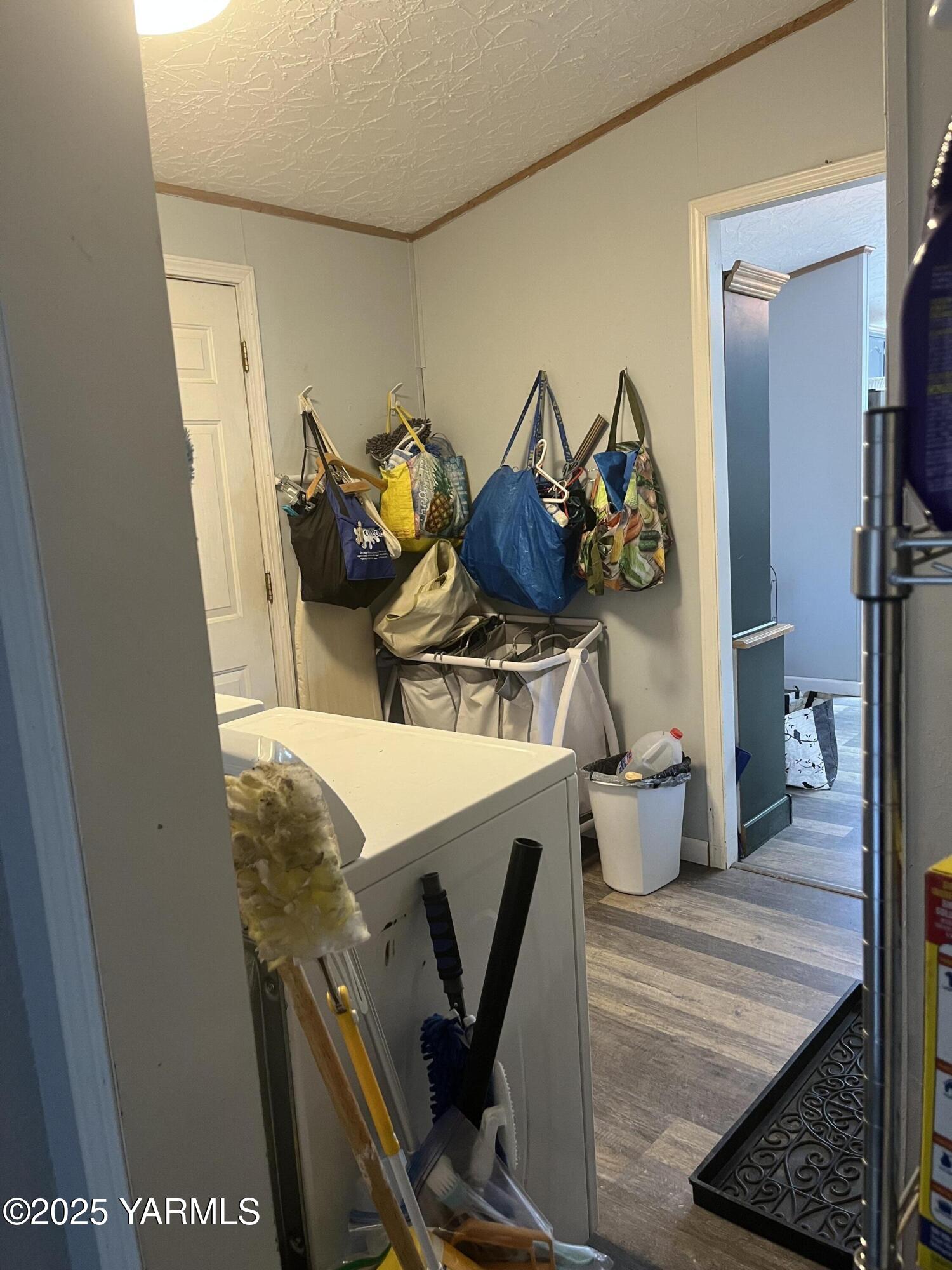 14190 North Wenas Road Selah, WA 98942 - Photo 55 of 62 a view of a dining room with furniture and wooden floor