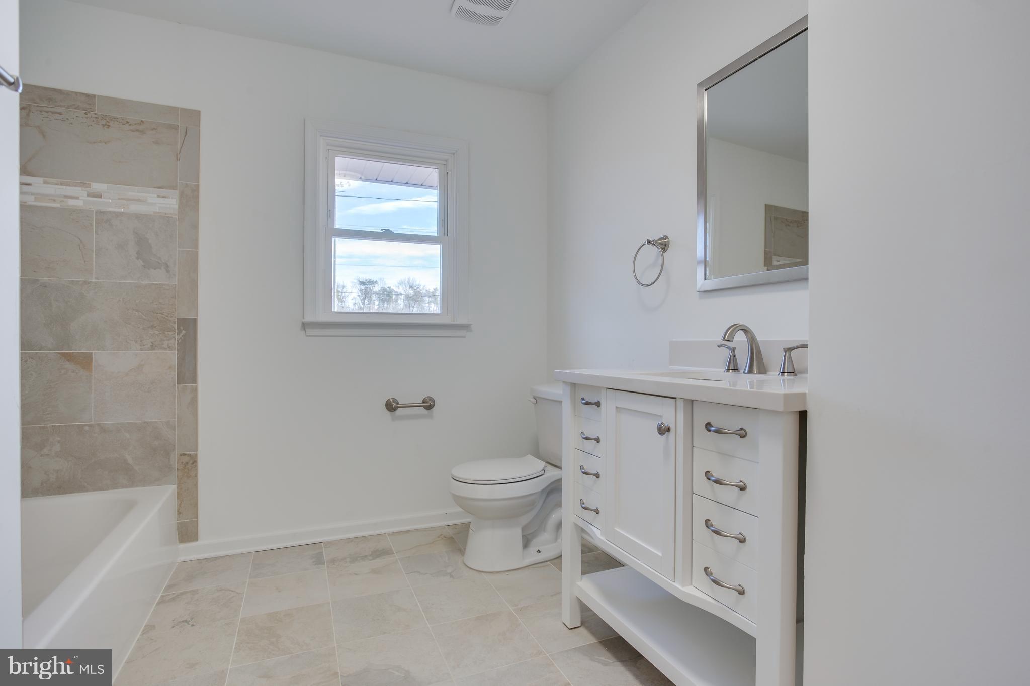 8355 Dahlgren Road King George, VA 22485 - Photo 19 of 30 Hall Full Bath with Upgraded Vanity and Hardware