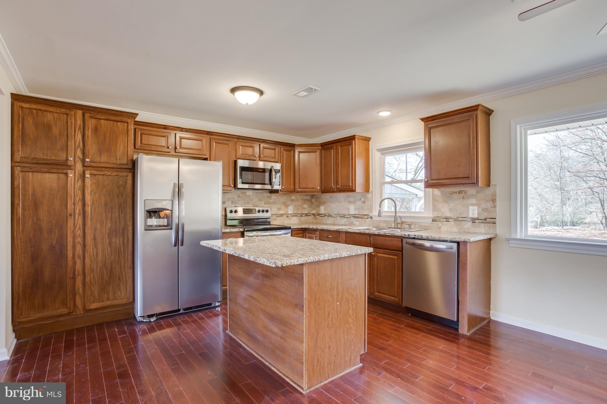 8355 Dahlgren Road King George, VA 22485 - Photo 3 of 30 Center Kitchen Island, Wood Floors