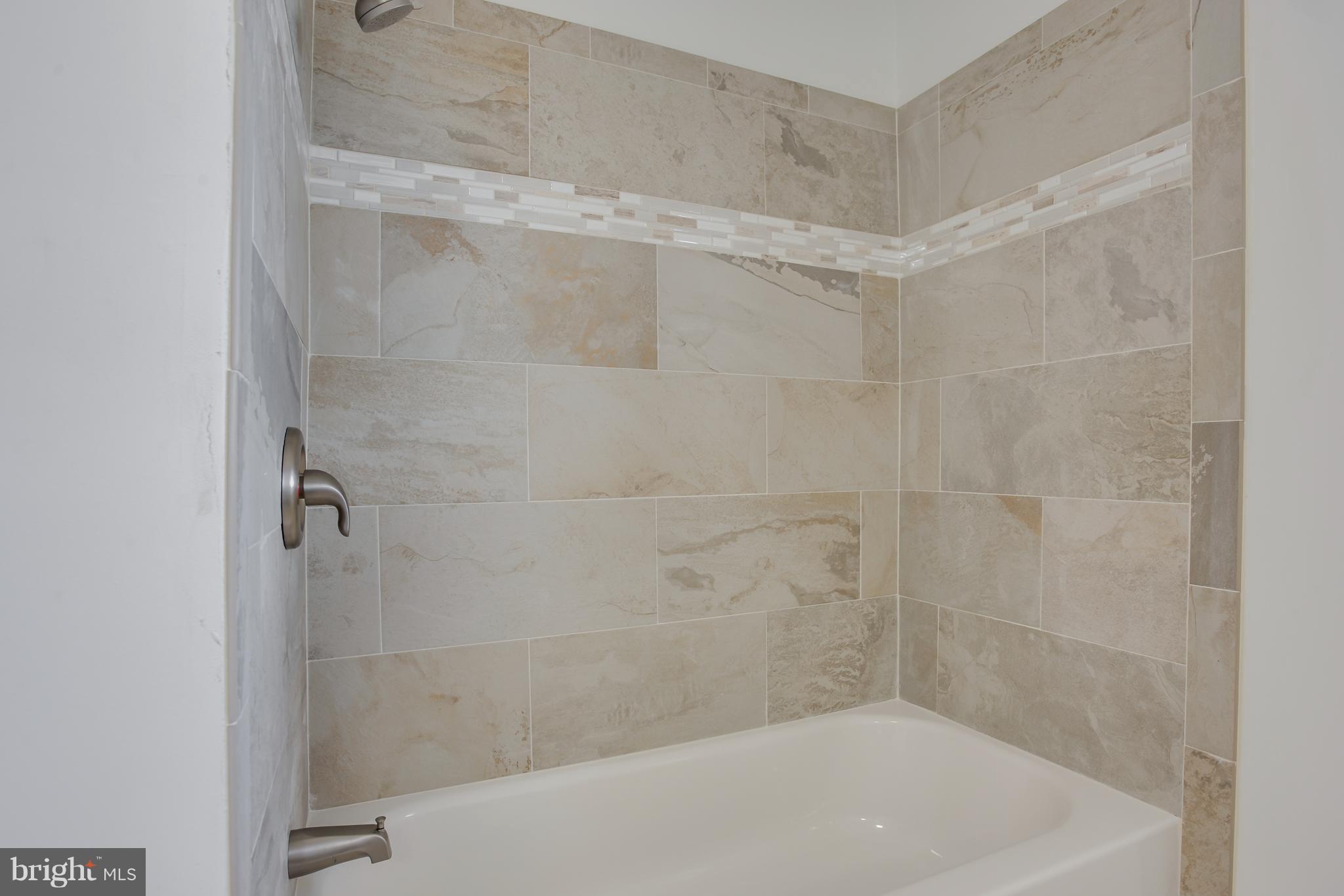 8355 Dahlgren Road King George, VA 22485 - Photo 20 of 30 Brushed Nickel Faucets and Upgraded Tile