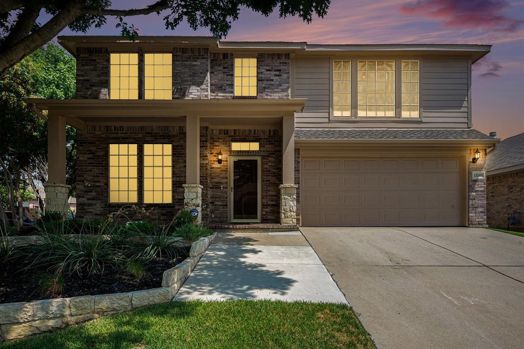 13240 Harvest Ridge Road Fort Worth, TX 76244 - Photo 1 of 1 View of front facade with concrete driveway, covered porch, a garage, and brick siding - enhanced photo