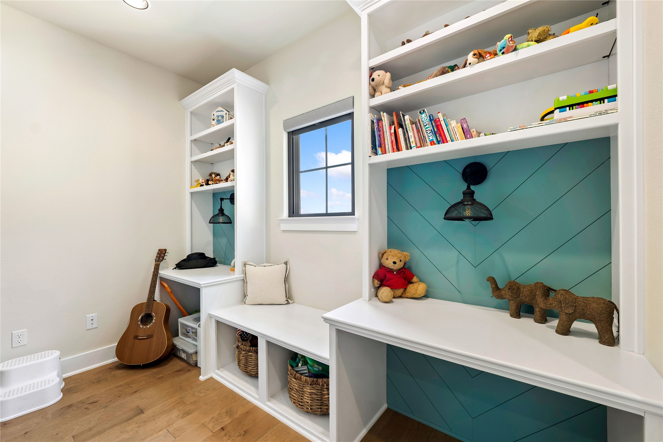 2408 Nate's Place Georgetown, TX 78633 - Photo 27 of 40 Built-in desks and shelving create a versatile and functional space.