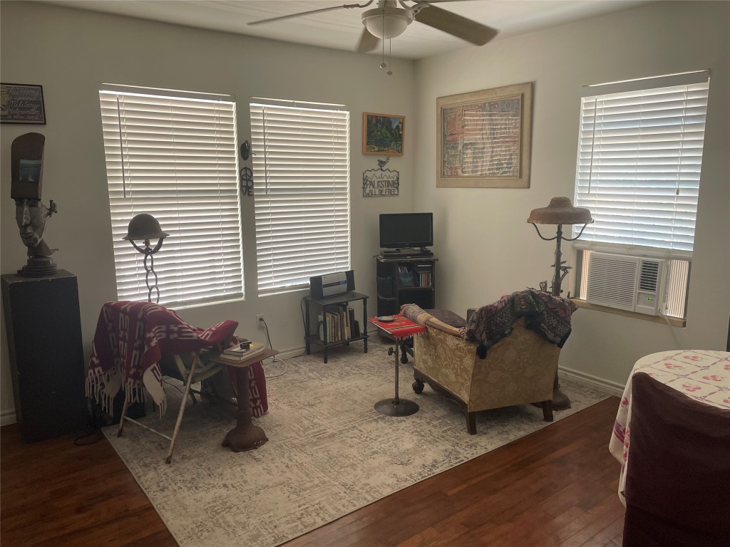1115 Mark Street, Unit D Austin, TX 78721 - Photo 4 of 8 a living room with furniture and a window