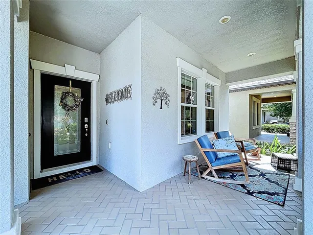 a living room with furniture or couch and a window