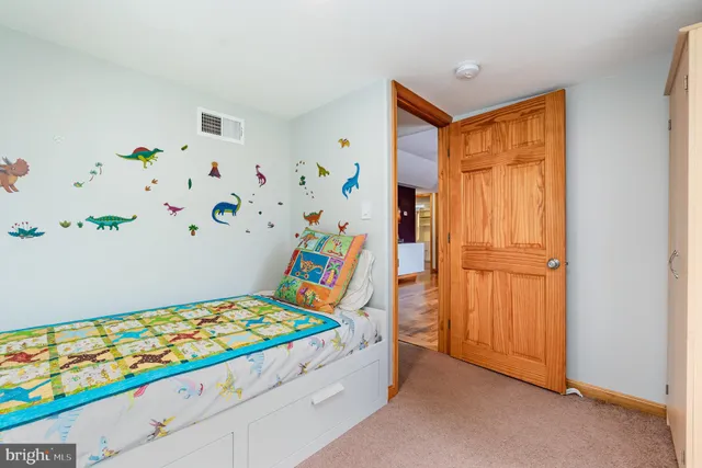 a room with toys and a large window