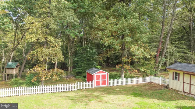 a view of shower and a yard