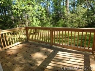 2343 Roland Drive, Unit D Monroe, NC 28110 - Photo 11 of 13 a view of a balcony with wooden floor