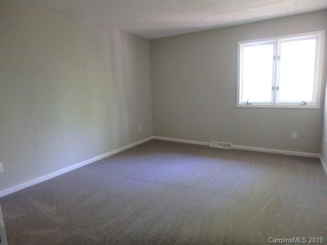 2343 Roland Drive, Unit D Monroe, NC 28110 - Photo 7 of 13 an empty room with a window