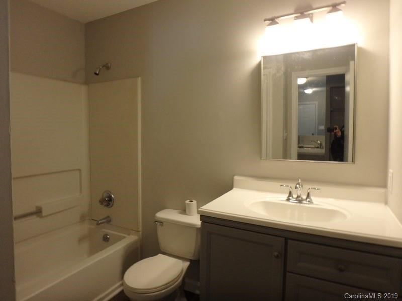 2343 Roland Drive, Unit D Monroe, NC 28110 - Photo 10 of 13 a bathroom with a sink toilet and shower