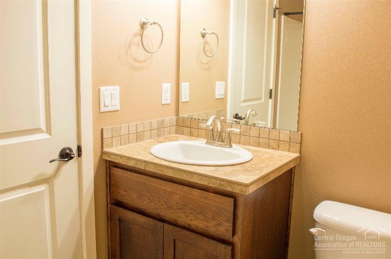 61723 Rigel Way Bend, OR 97702 - Photo 14 of 17 a bathroom with a sink and a mirror