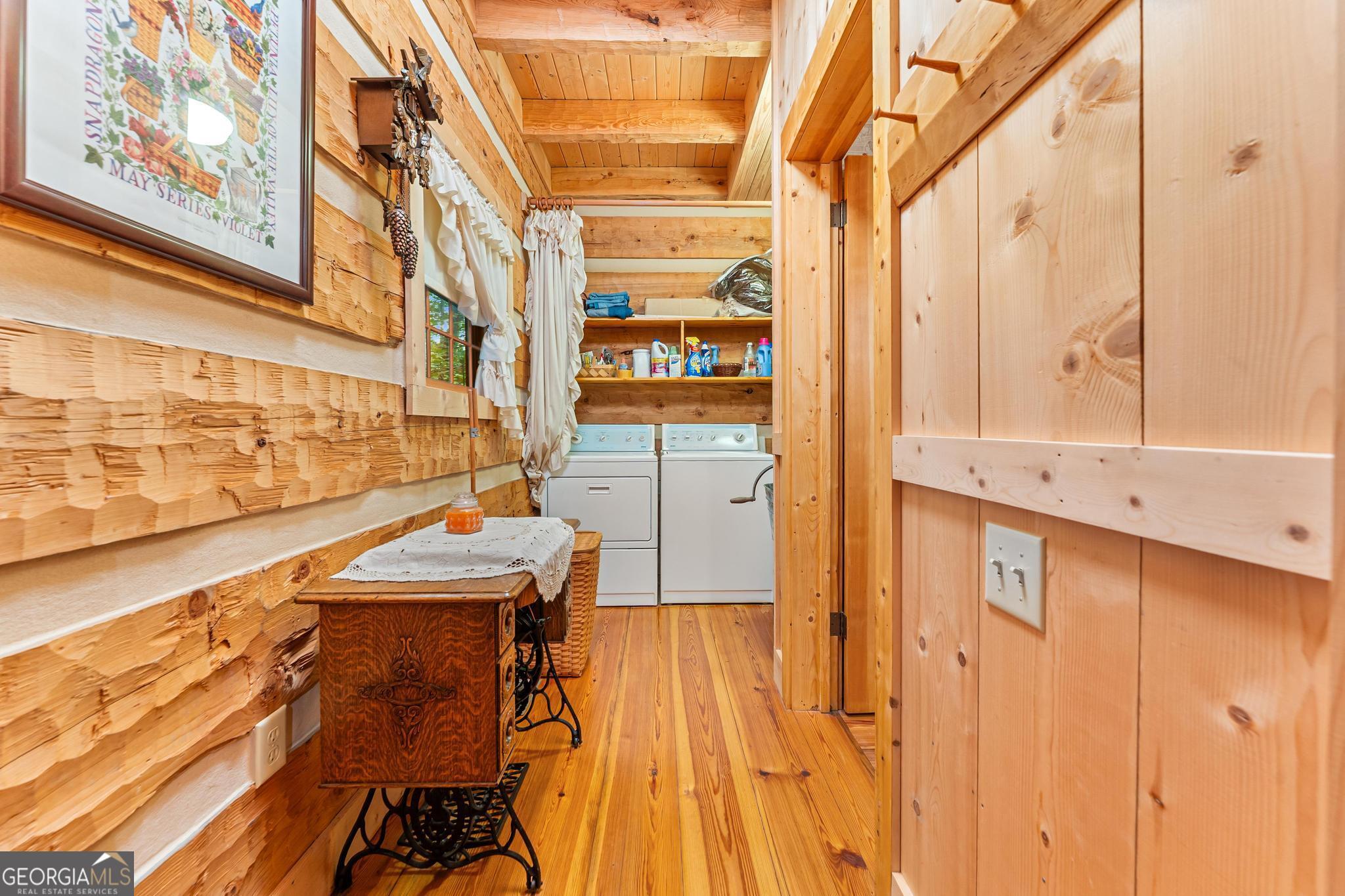 1127 Sautee Trail Sautee Nacoochee, GA 30571 - Photo 31 of 85 a view of a balcony with wooden floor and furniture