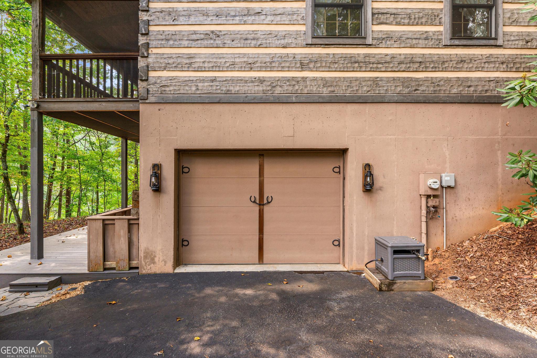 1127 Sautee Trail Sautee Nacoochee, GA 30571 - Photo 39 of 85 a view of a house with a door and wooden bench
