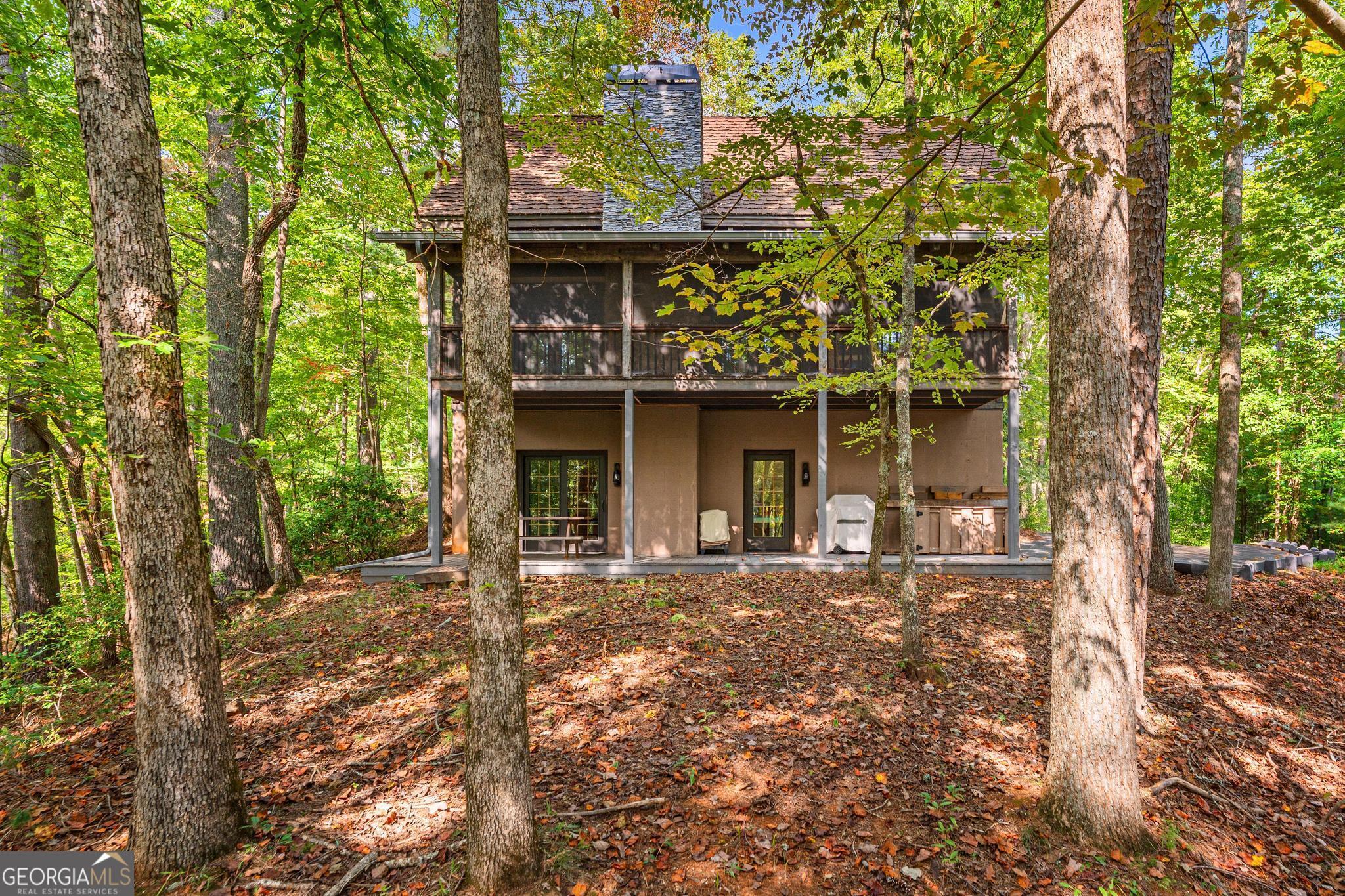 1127 Sautee Trail Sautee Nacoochee, GA 30571 - Photo 40 of 85 front view of a house with a tree