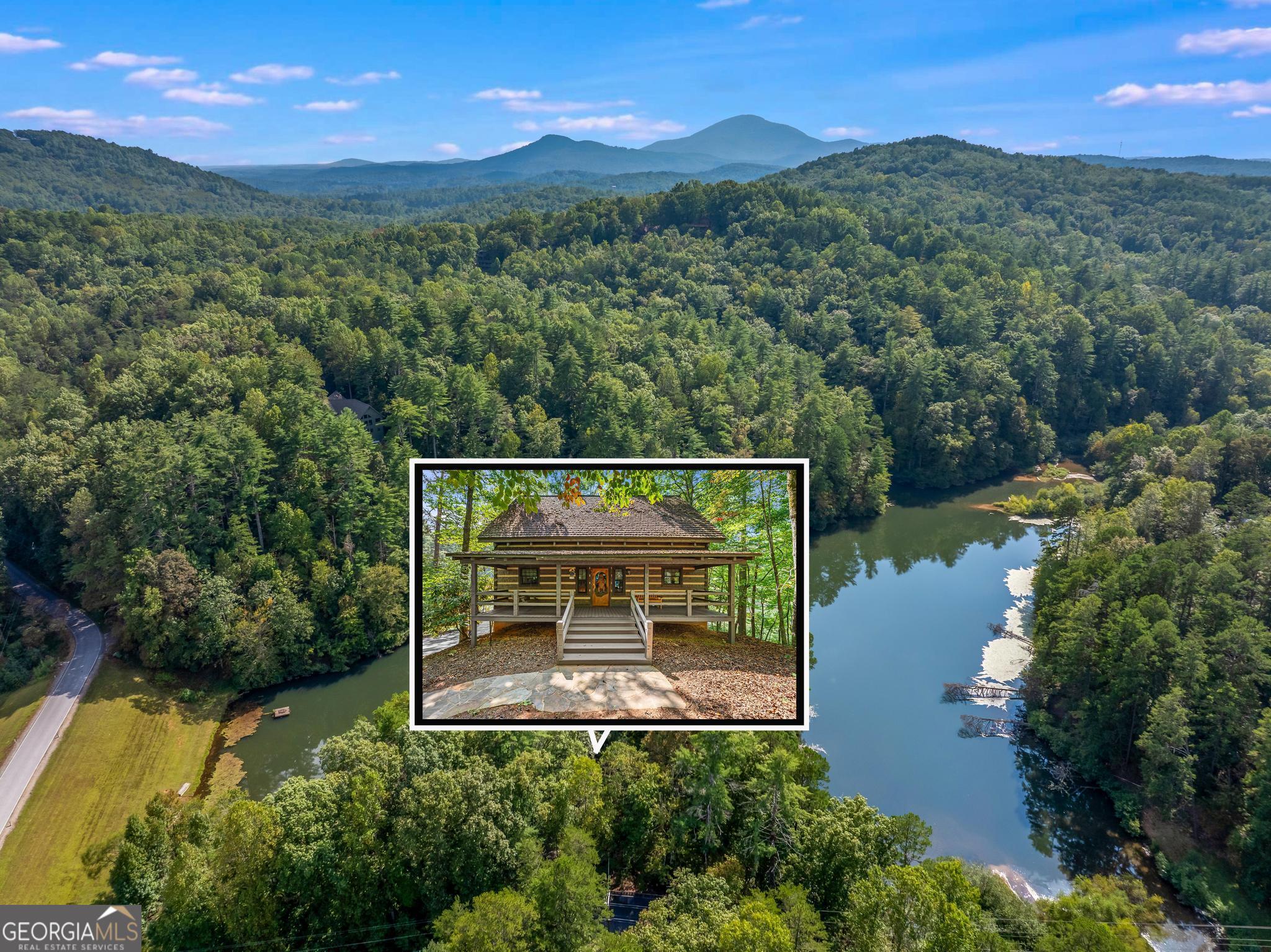 1127 Sautee Trail Sautee Nacoochee, GA 30571 - Photo 44 of 85 an aerial view of house with yard swimming pool and mountains