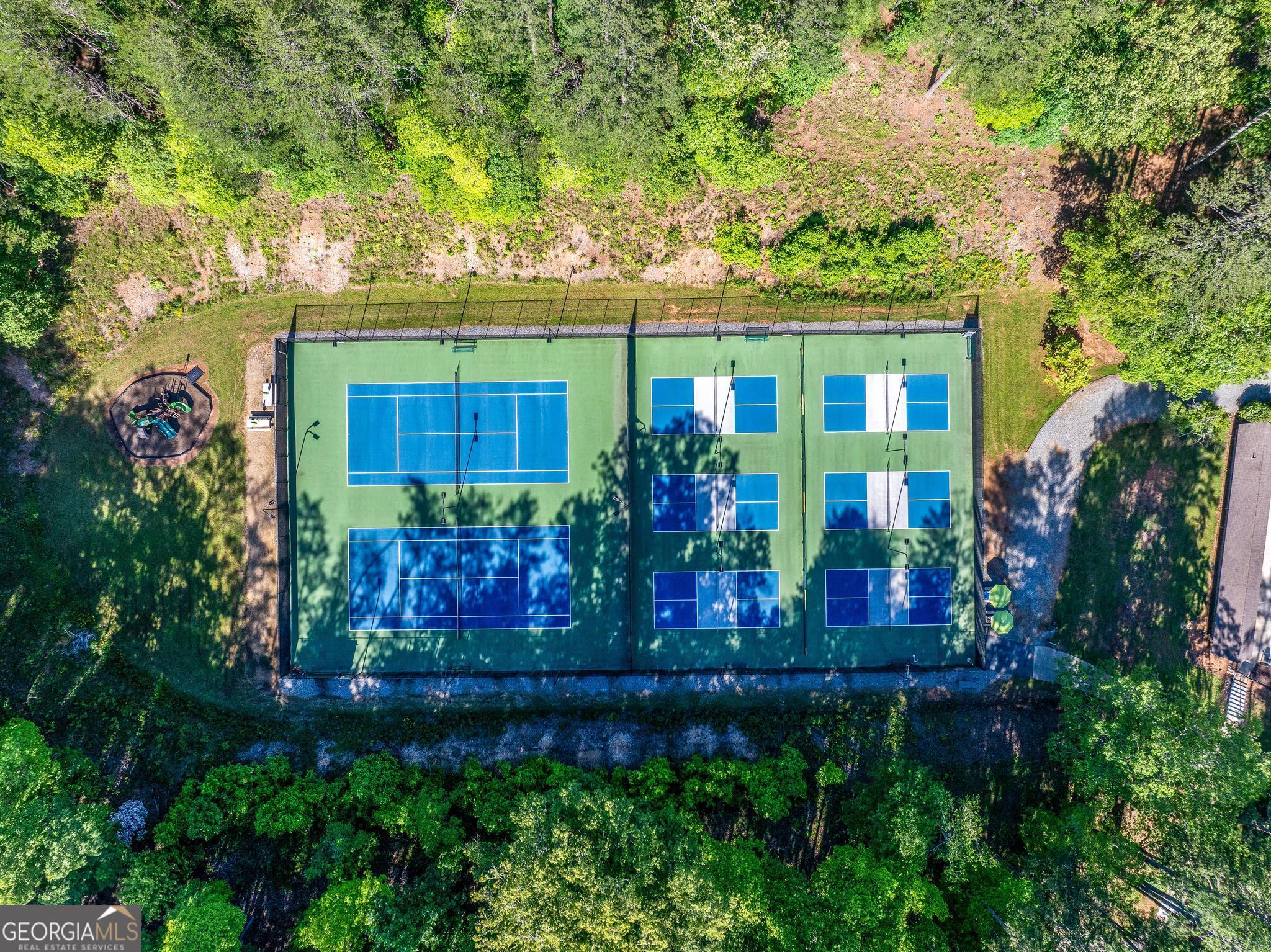 1127 Sautee Trail Sautee Nacoochee, GA 30571 - Photo 51 of 85 front view of a house with a large tree