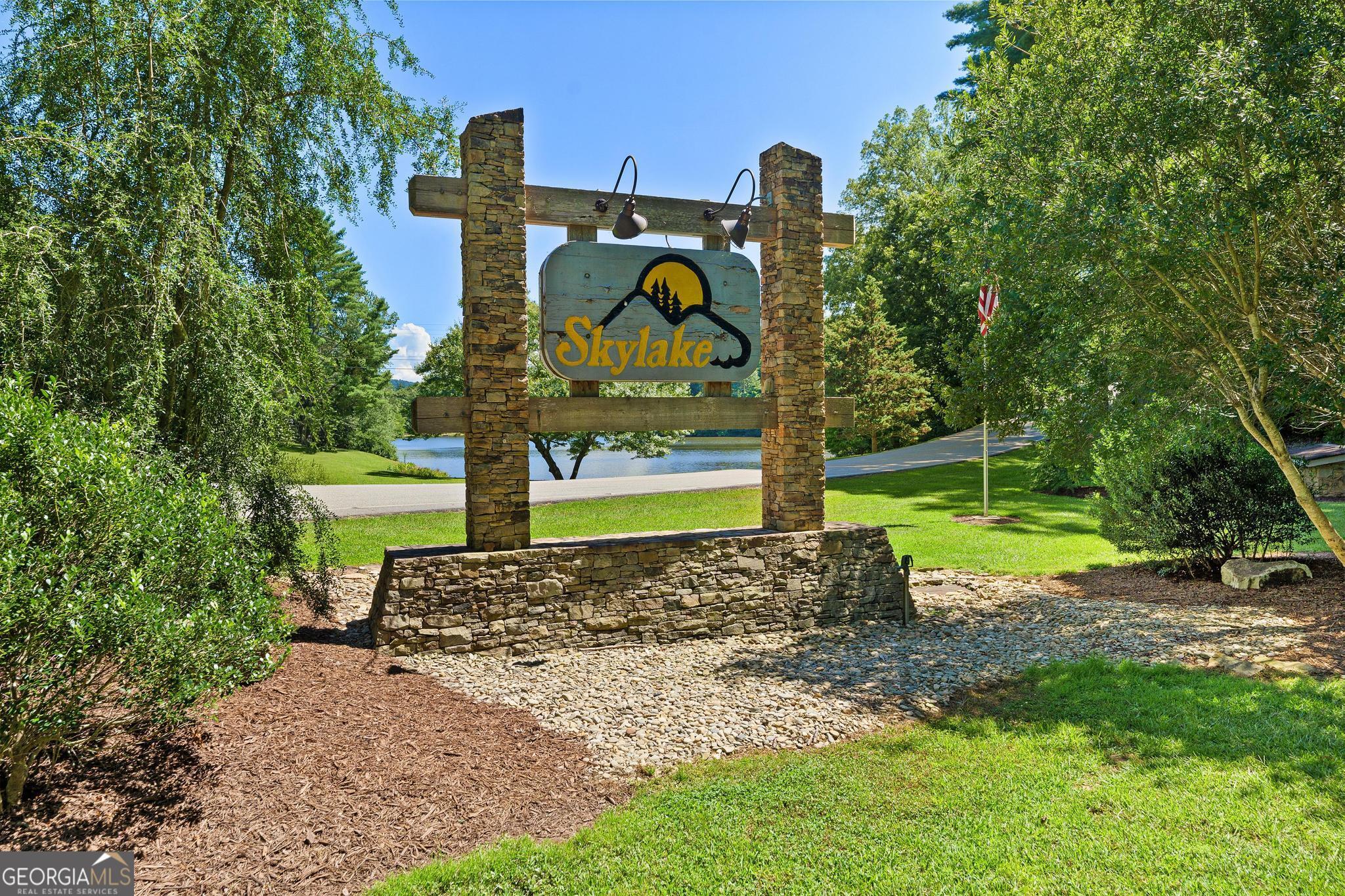 1127 Sautee Trail Sautee Nacoochee, GA 30571 - Photo 54 of 85 a view of a park with swings and slides