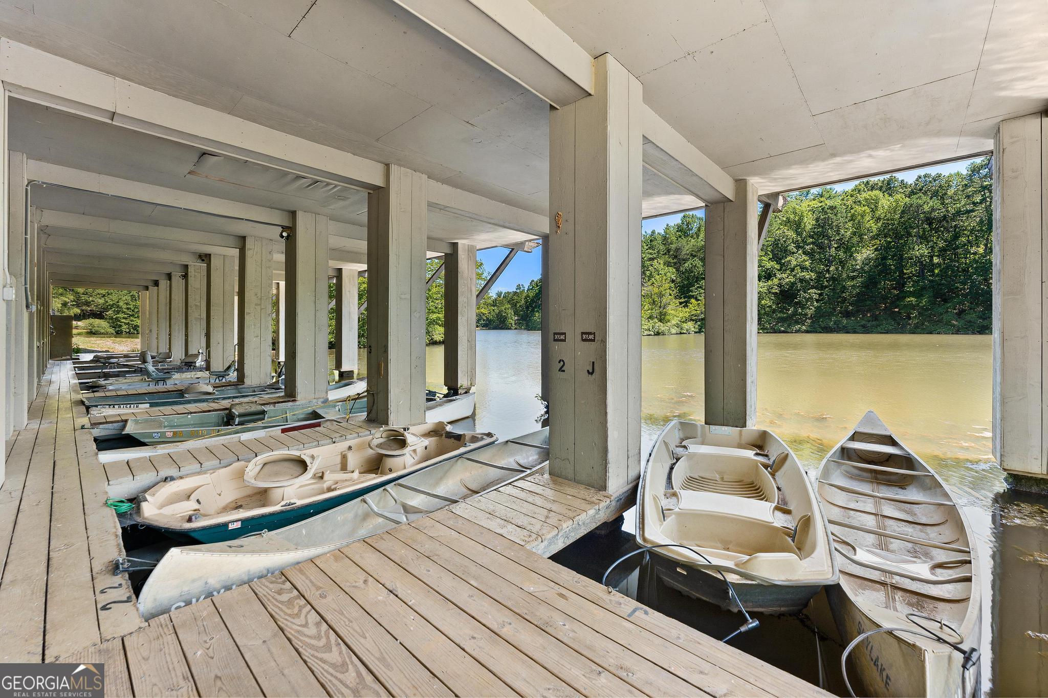 1127 Sautee Trail Sautee Nacoochee, GA 30571 - Photo 64 of 85 a living room with furniture and large windows