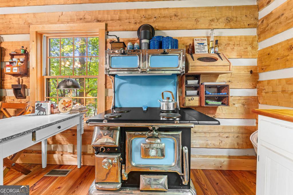 1127 Sautee Trail Sautee Nacoochee, GA 30571 - Photo 81 of 85 a stove top oven sitting inside of a kitchen