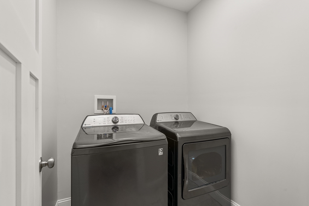 654 Skyline Trail Chester, MA 01011 - Photo 15 of 32 a utility room with dryer and washer