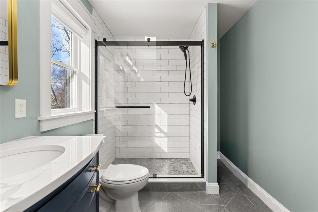 654 Skyline Trail Chester, MA 01011 - Photo 20 of 32 a bathroom with a sink toilet and shower