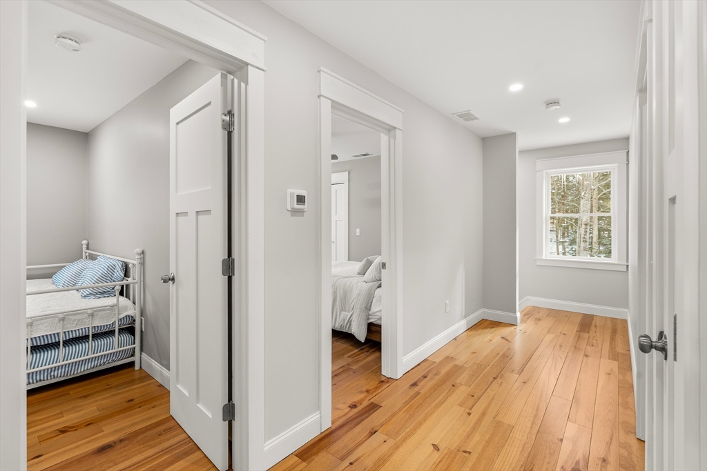 654 Skyline Trail Chester, MA 01011 - Photo 25 of 32 a view of bedroom with wooden floor