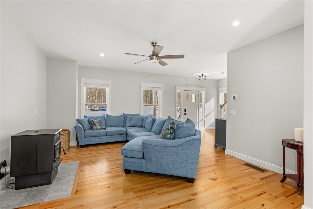 654 Skyline Trail Chester, MA 01011 - Photo 10 of 32 a living room with furniture and a wooden floor