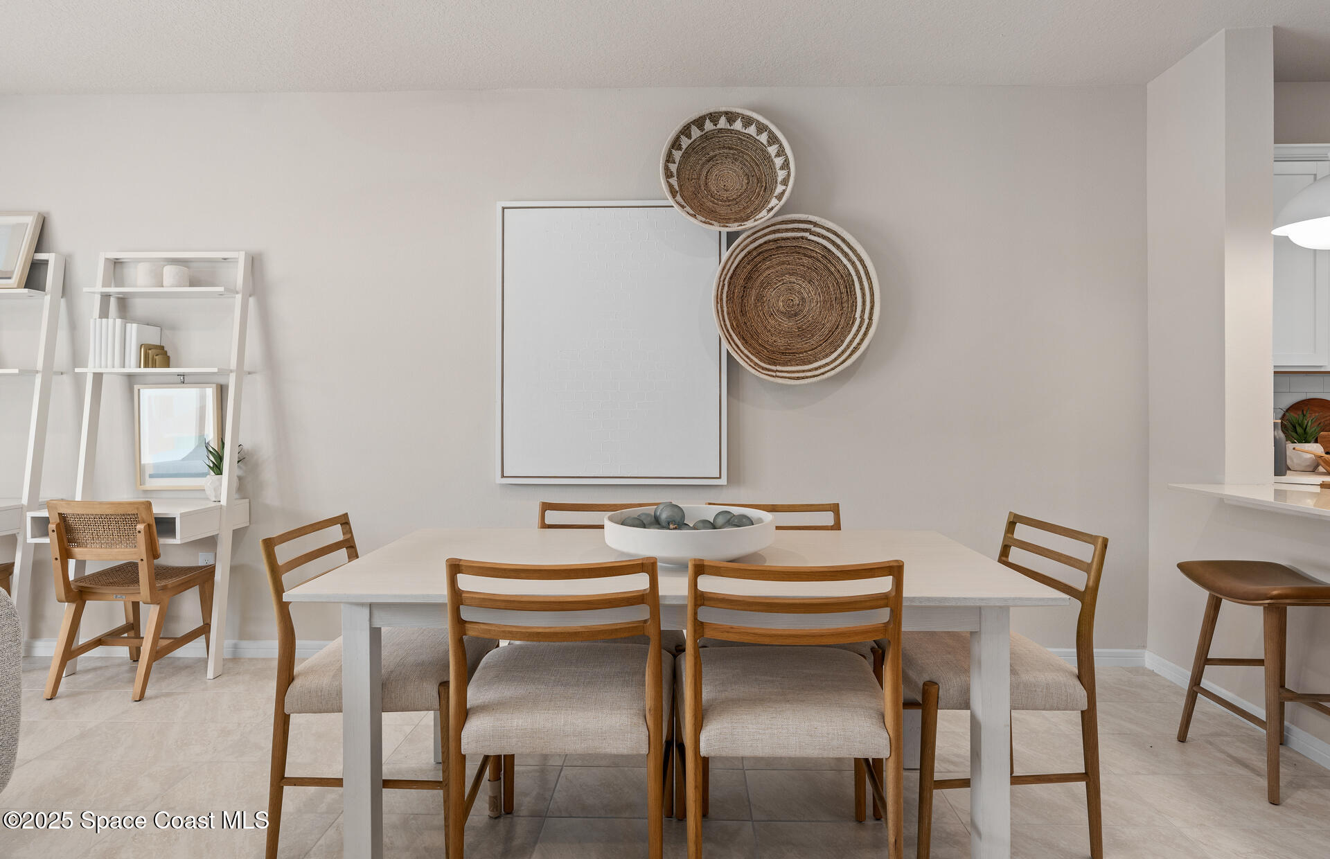 4317 Jetty Lane Palm Bay, FL 32905 - Photo 11 of 16 a view of a dining room that has a dining table and chairs