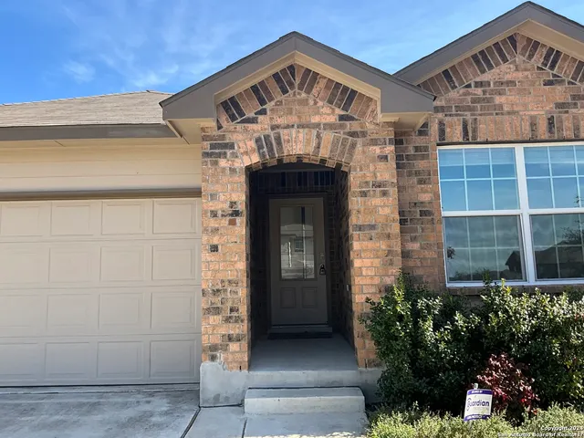 a front view of a house with a shower