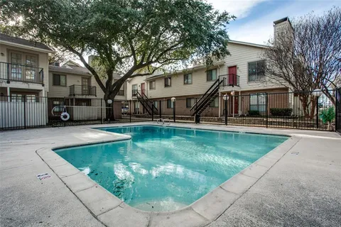 a view of a house with a swimming pool