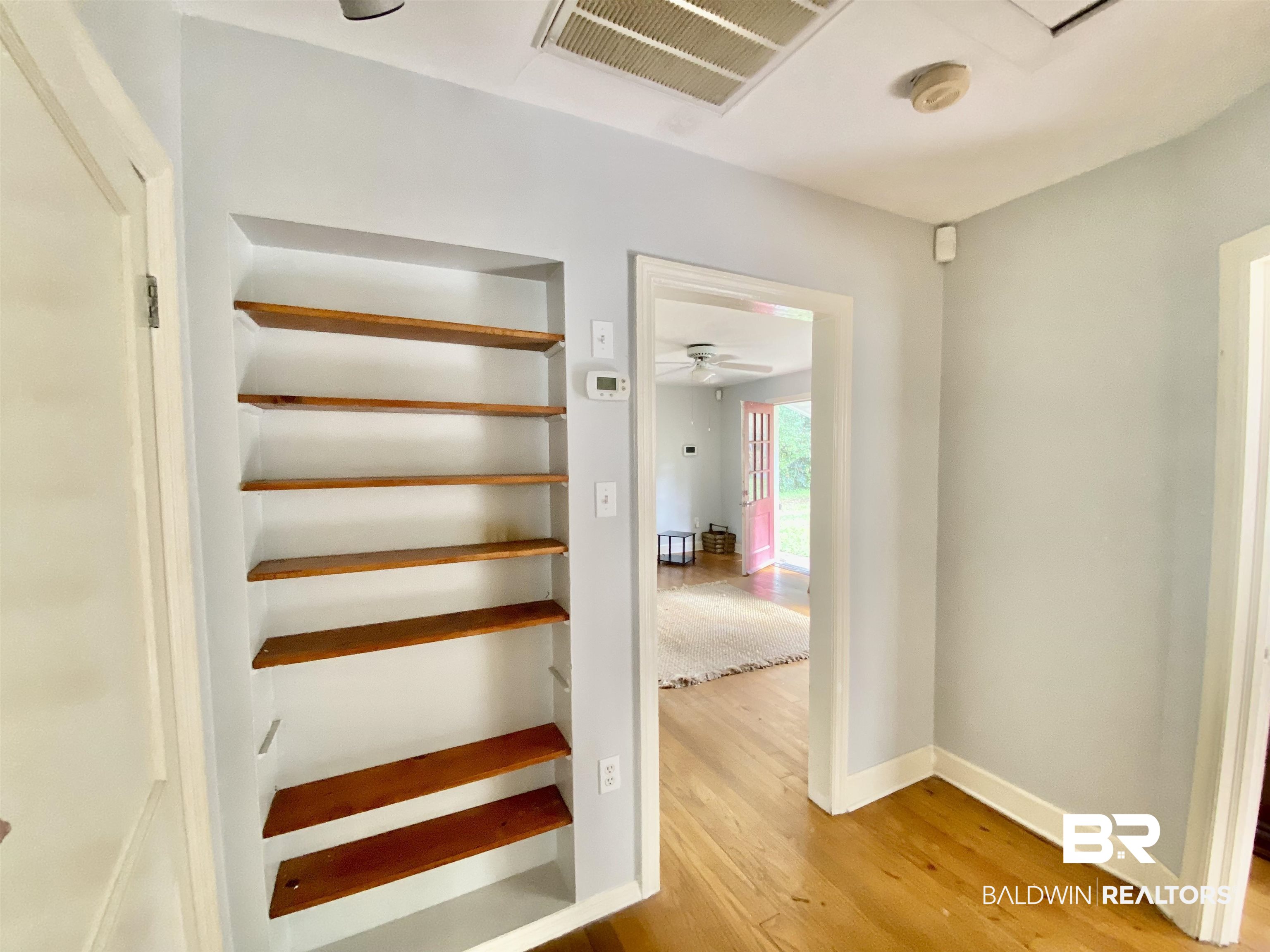 323 Pineview Lane Mobile, AL 36608 - Photo 5 of 19 Hallway with Built-in Shelves