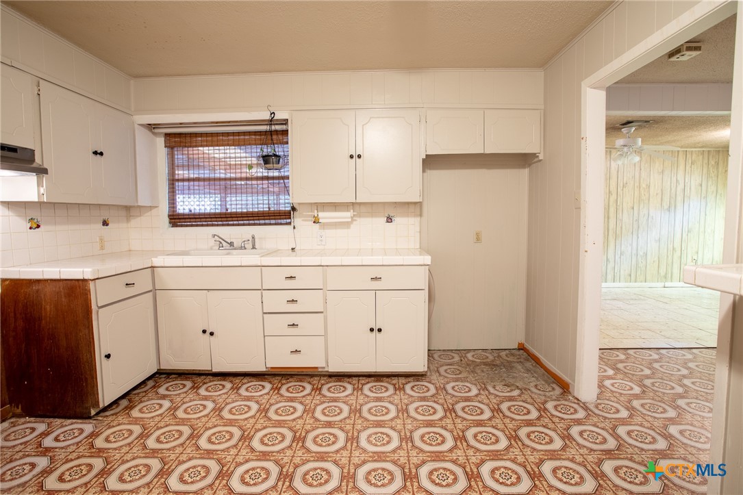 2903 Gayle Street Victoria, TX 77901 - Photo 8 of 21 a room with a cabinets and a dresser