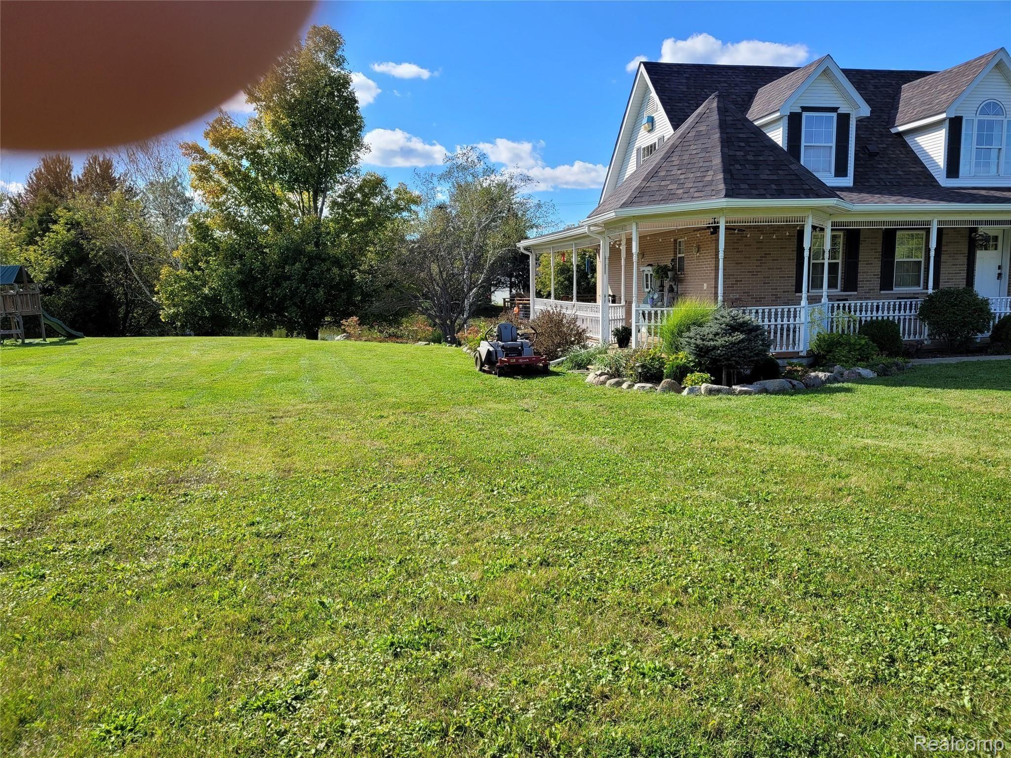 2735 North Latson Road Howell, MI 48855 - Photo 2 of 24 front 2.jpg