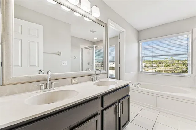 a view of an ocean with a swimming pool