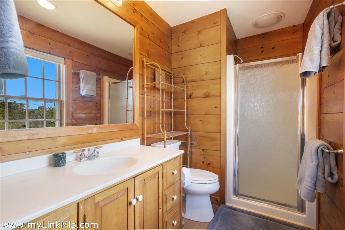 13 Eat Fire Spring Road Nantucket, MA 02554 - Photo 24 of 43 a bathroom with a sink a toilet and shower