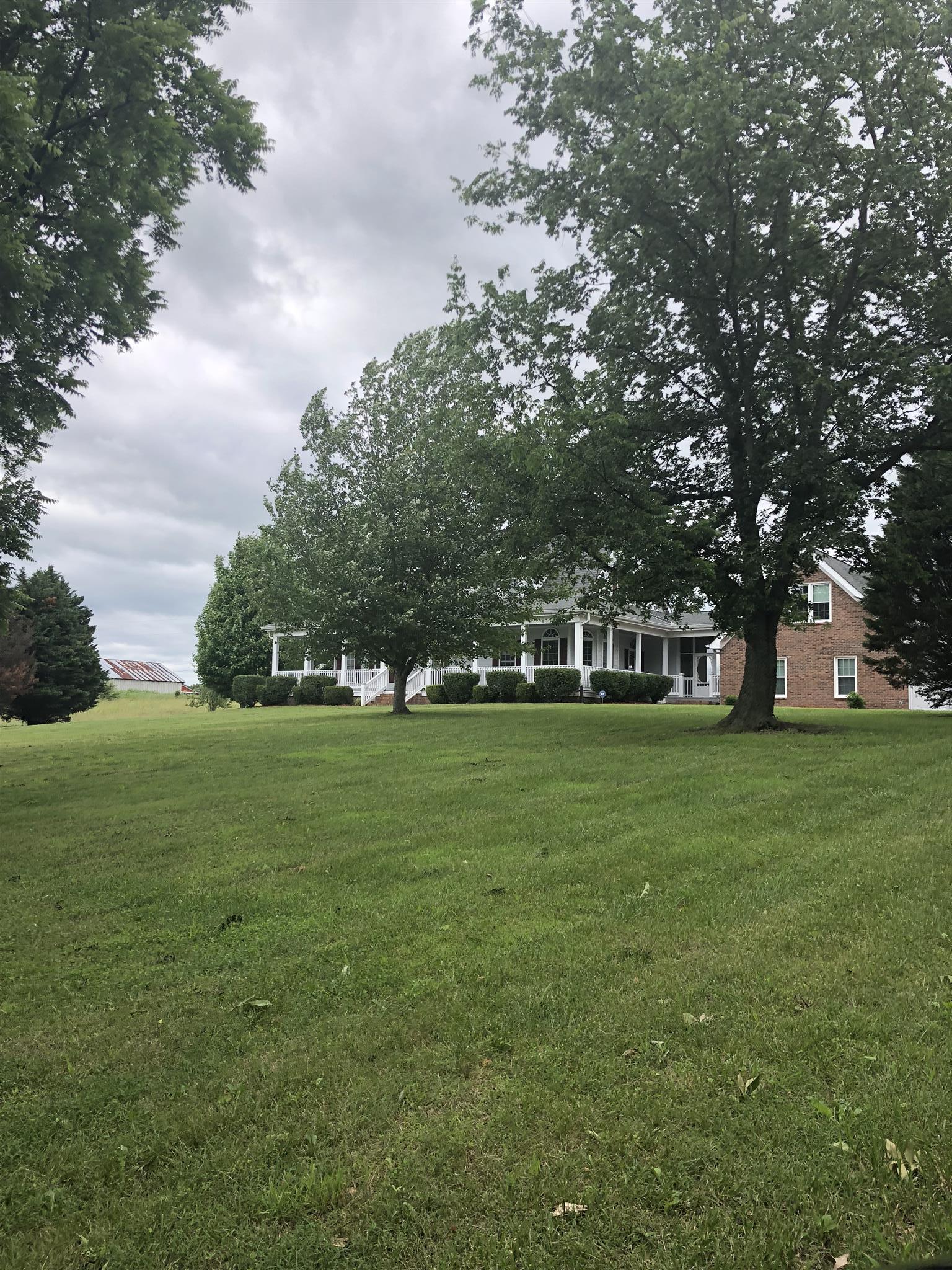 5141 Minnis Road Springfield, TN 37172 - Photo 3 of 27 This luxury home sits on 6+ acres and offers privacy and an inground pool!