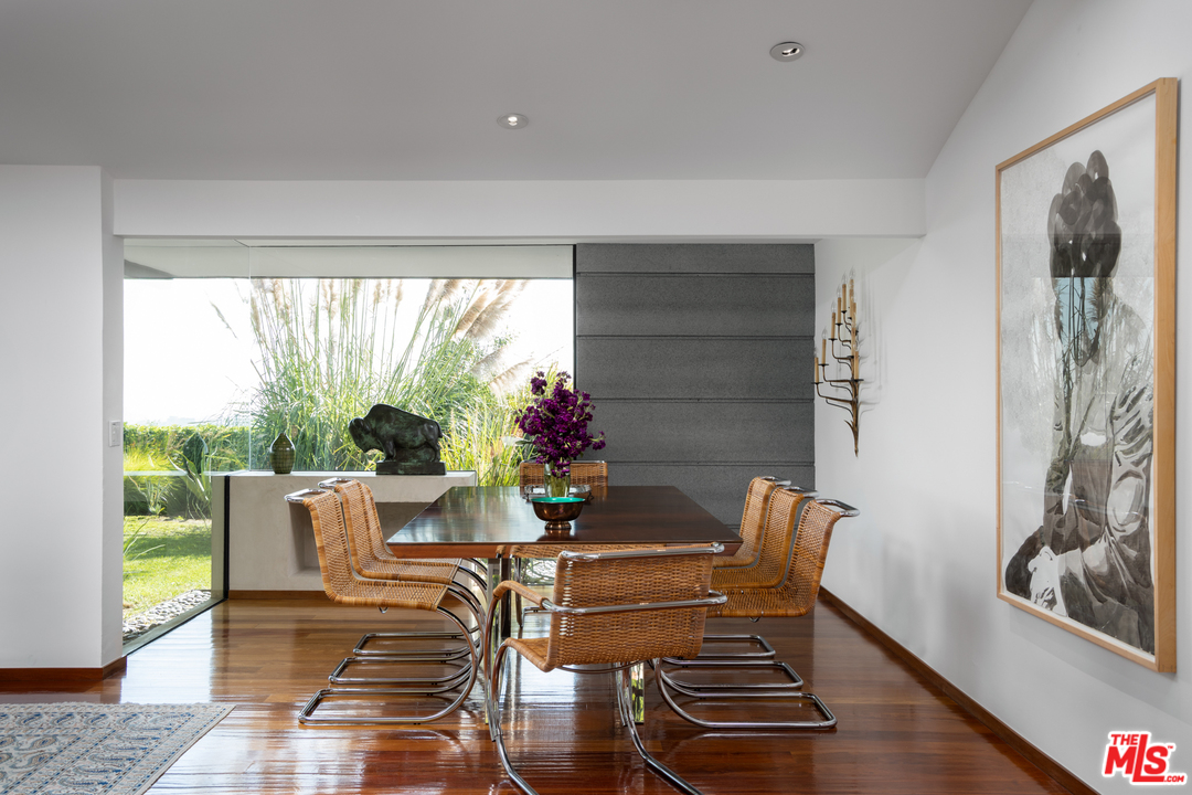 1375 Summitridge Place Beverly Hills, CA 90210 - Photo 4 of 21 a view of a dining room with furniture window and outside view