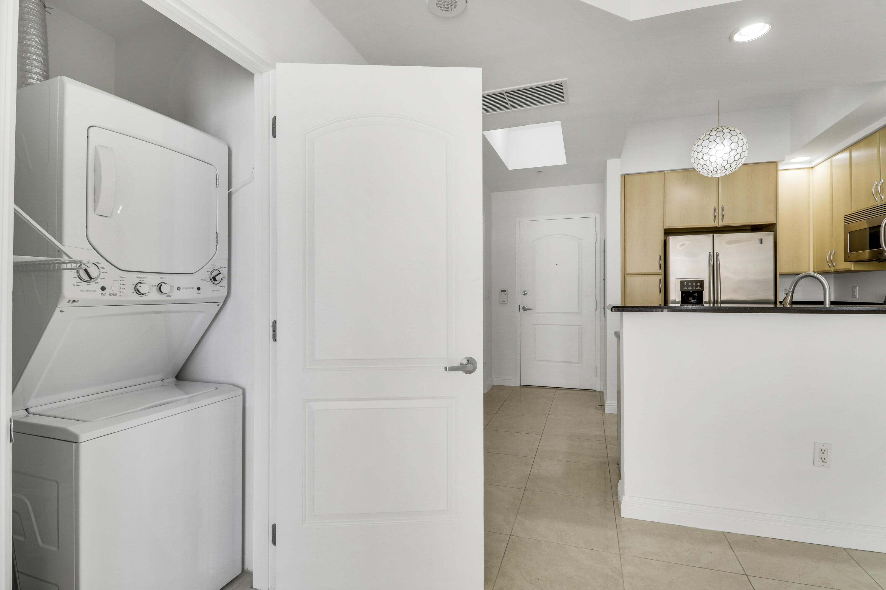 801 South Olive Avenue, Unit 1523 West Palm Beach, FL 33401 - Photo 25 of 38 Laundry Closet