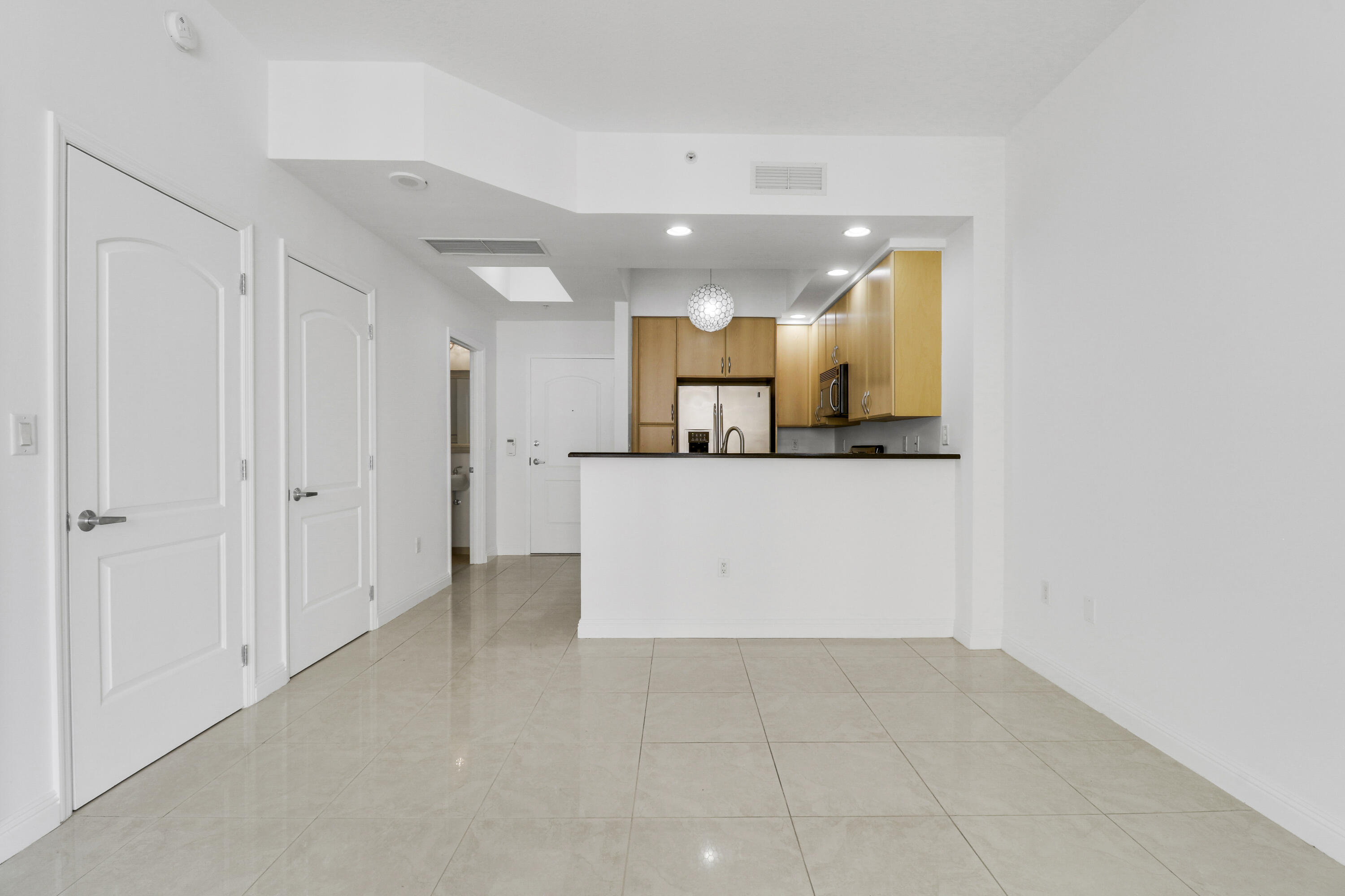 801 South Olive Avenue, Unit 1523 West Palm Beach, FL 33401 - Photo 7 of 38 Living/Dining Area