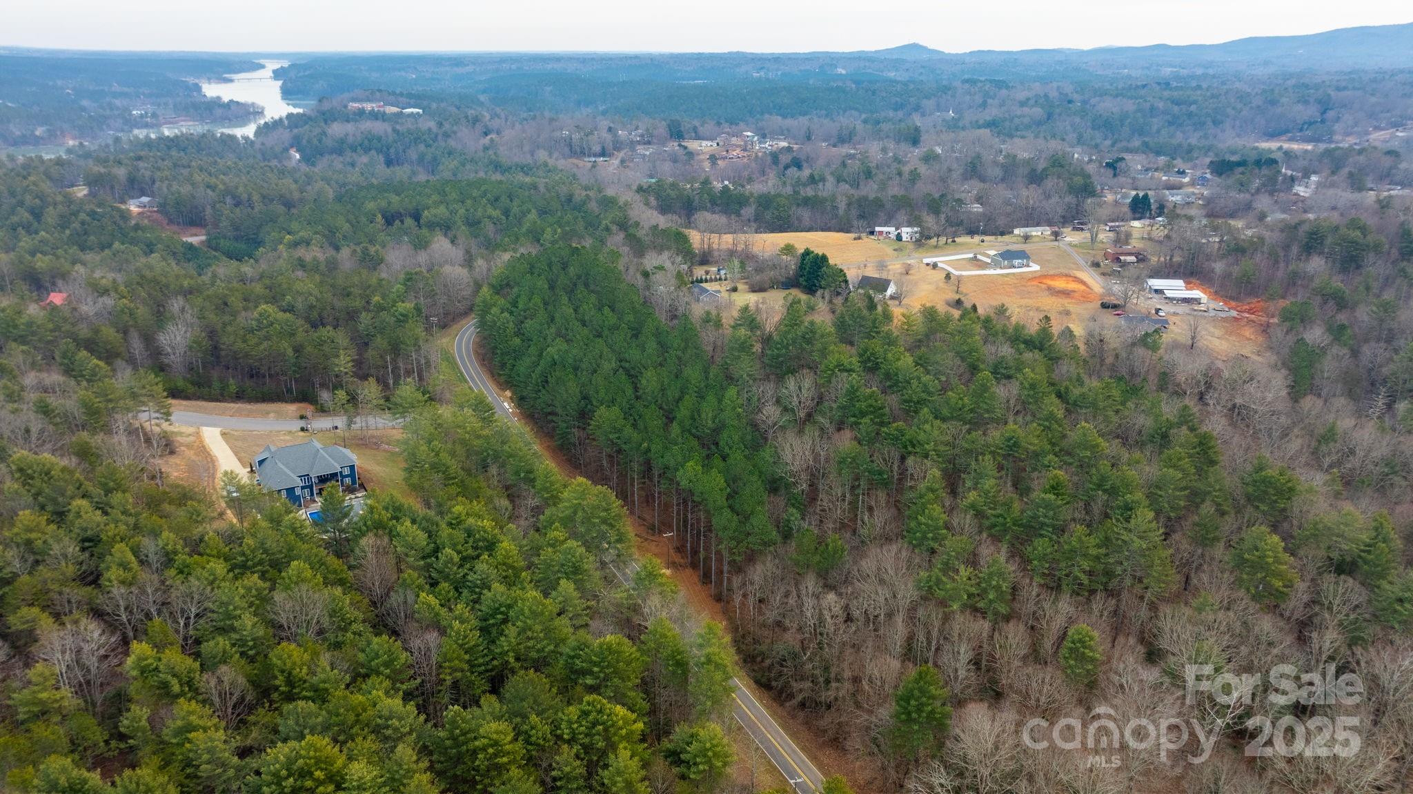 4753 John Berry Road Valdese, NC 28690 - Photo 23 of 28 a view of a city with lush green forest