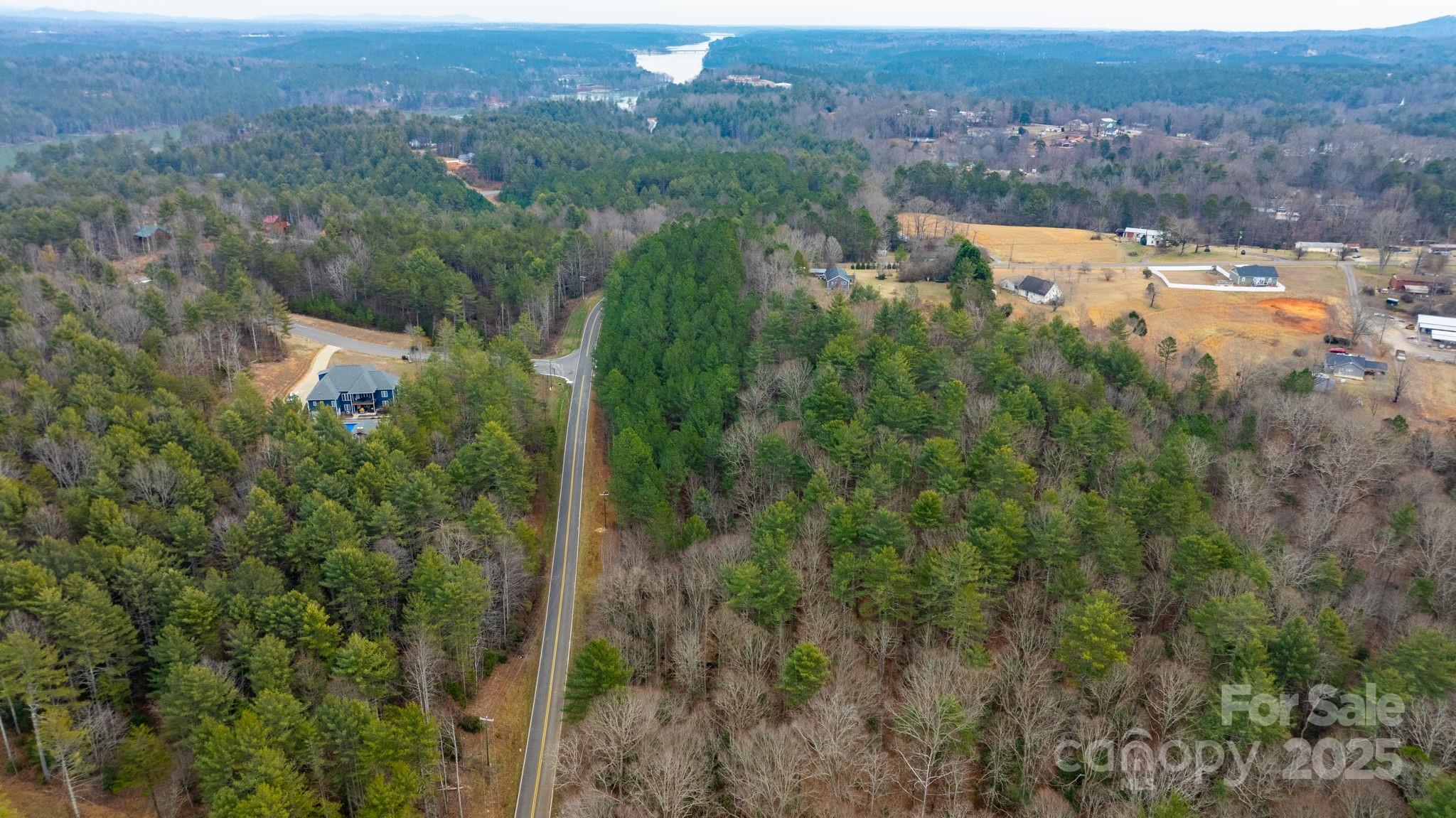 4753 John Berry Road Valdese, NC 28690 - Photo 24 of 28 an aerial view of residential houses with outdoor space and trees
