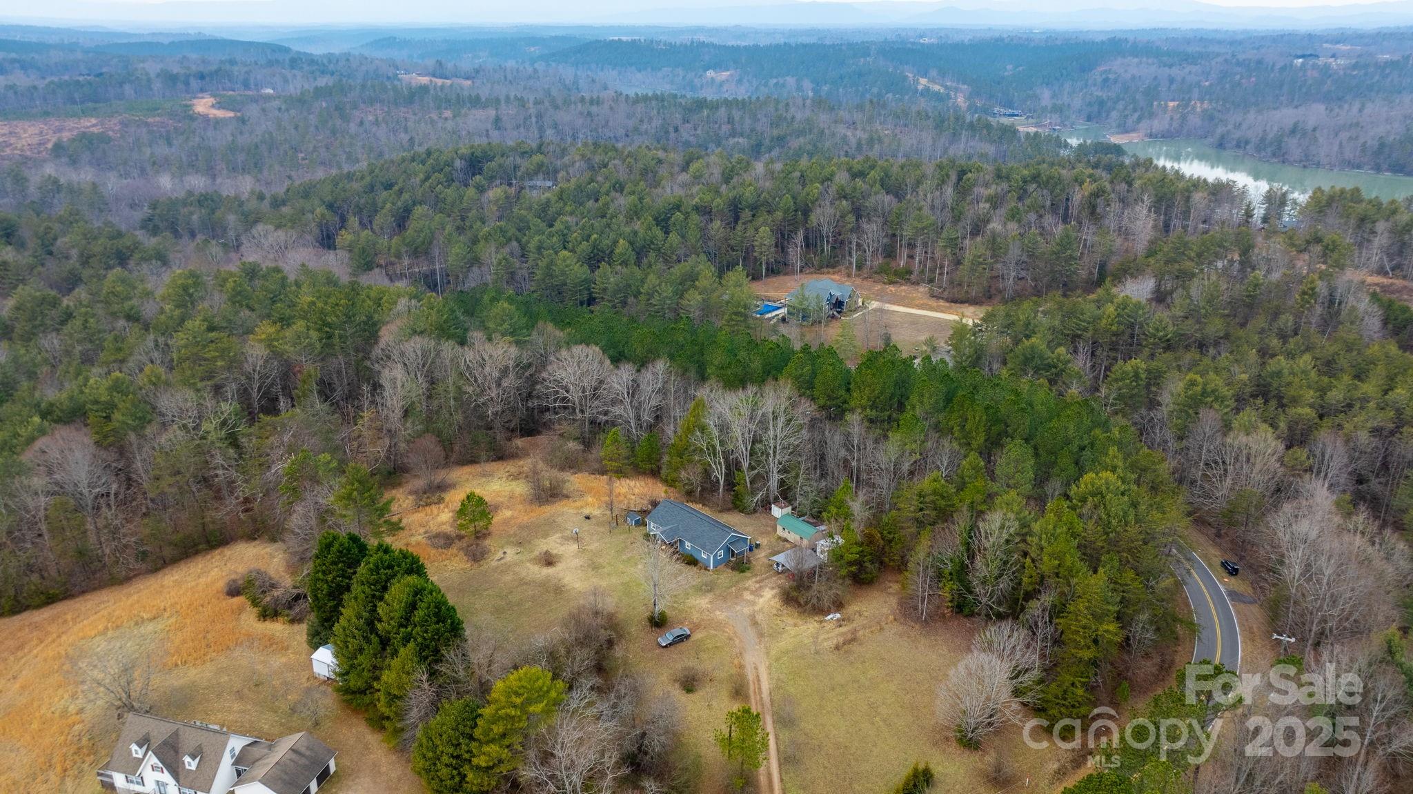 4753 John Berry Road Valdese, NC 28690 - Photo 28 of 28 a view of a city with lush green forest