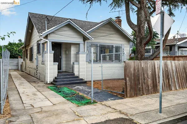 a front view of a house with a porch