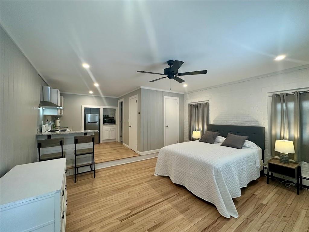 7 Robin Brae, Unit 3 Warwick, NY 10990 - Photo 1 of 1 a bedroom with a bed and wooden floor