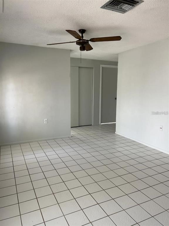 9011 St Clair Lane Port Richey, FL 34668 - Photo 12 of 20 a view of an empty room