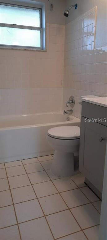 9011 St Clair Lane Port Richey, FL 34668 - Photo 20 of 20 a bathroom with a sink a toilet and bathtub