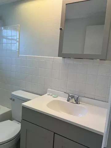 a bathroom with a sink and a toilet