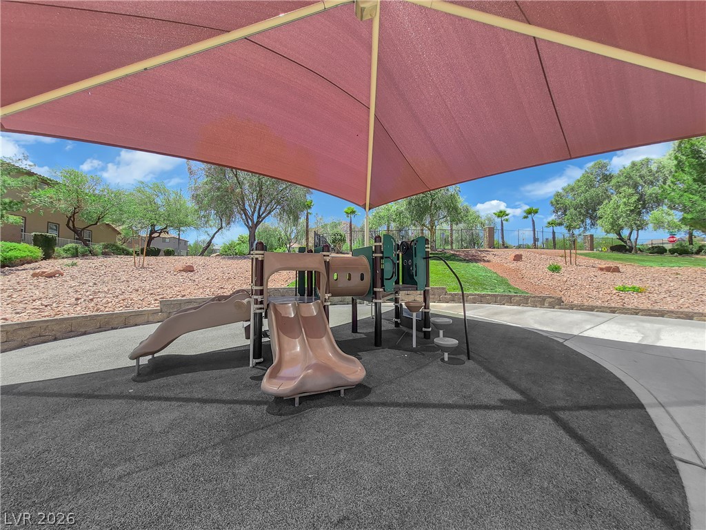 646 Monument Point Street Henderson, NV 89002 - Photo 35 of 44 A community playground, perfect for recreation, is shaded from the sun.