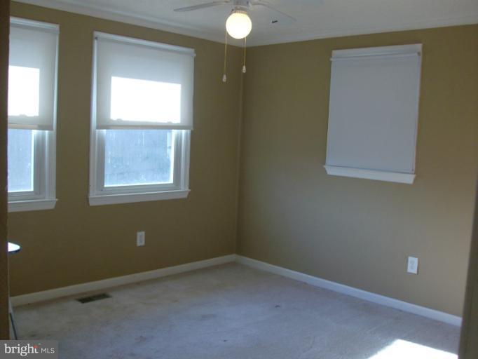 409 Circle Road Riva, MD 21140 - Photo 11 of 18 an empty room with a window